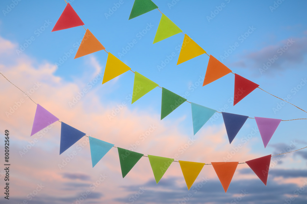 Fototapeta premium Festive bunting flags isolated on white