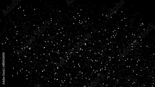 Falling rain on a black background photo
