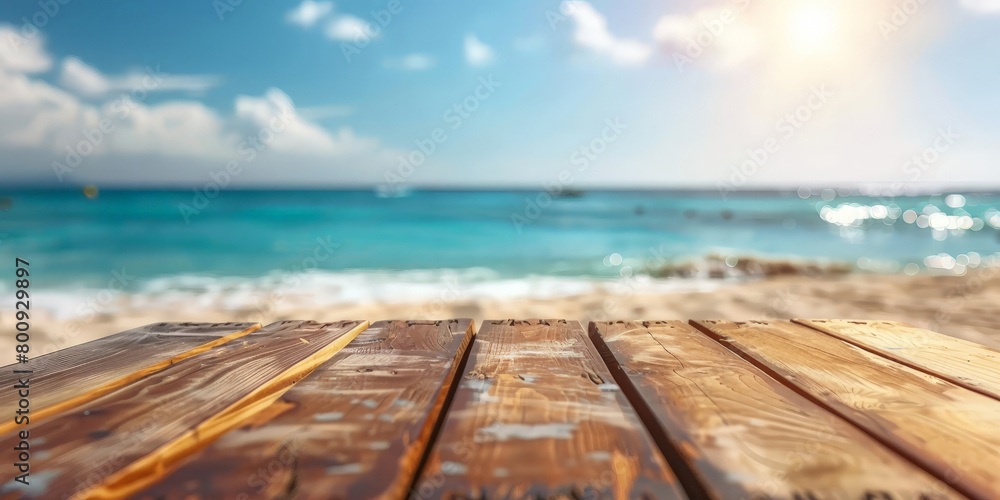empty Wooden table top with blurred beach background for product display, summer vacation concept. empty Wooden table top with blurred beach background for product display, summer vacation concept.