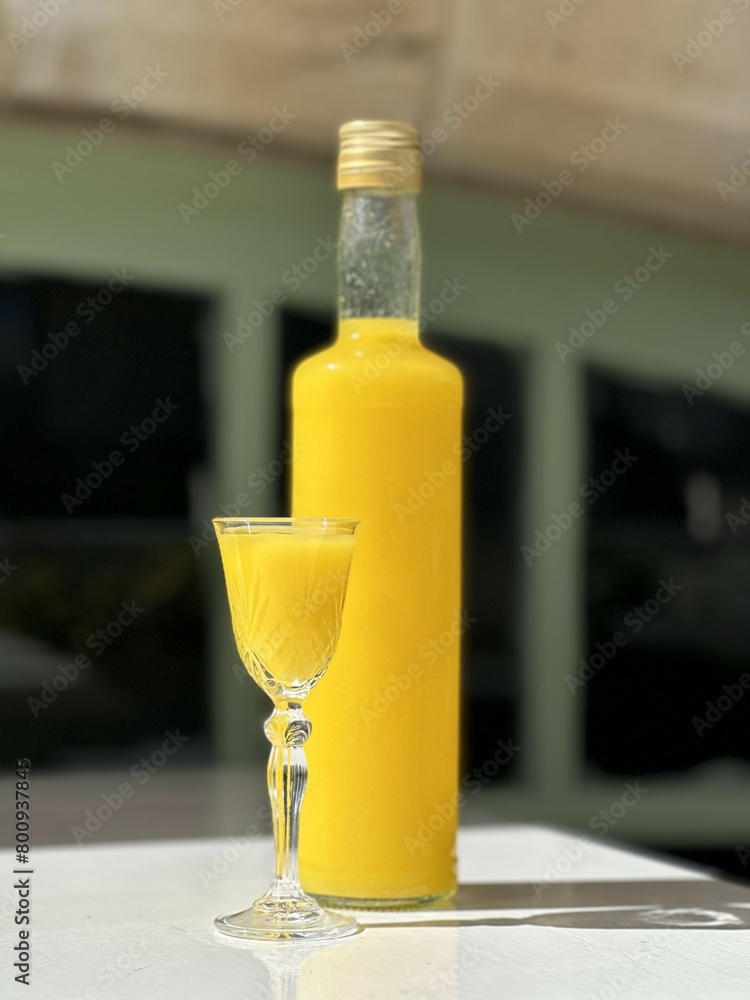 Pouring several glasses of Mexican Mezcal or Tequila shots. Classic Tequila small glasses being served. Pouring several glasses of Mexican Mezcal or Tequila shots. Classic Tequila small glasses being served.