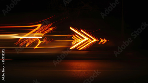 Long exposure photograph captures arrows of light trailing off into the distance, symbolizing speed, direction, and travel photo