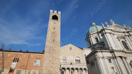 Facades of old town hall Broletto, tower Torre del Pegol, medieval house Loggia delle Grida on square Piazza Paolo VI in Brescia city photo