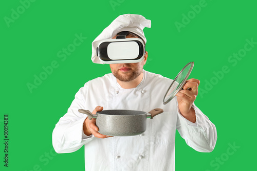 Male chef with cooking pot ...