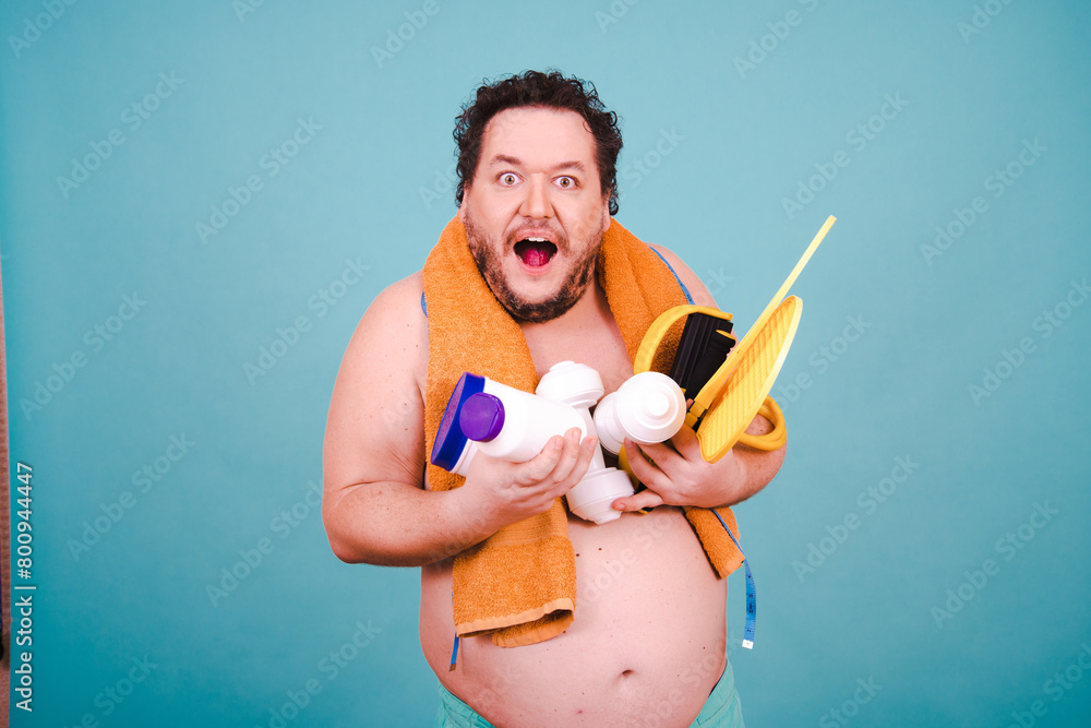Funny fat man doing sports. Healthy lifestyle. Funny fat man doing sports. Healthy lifestyle.