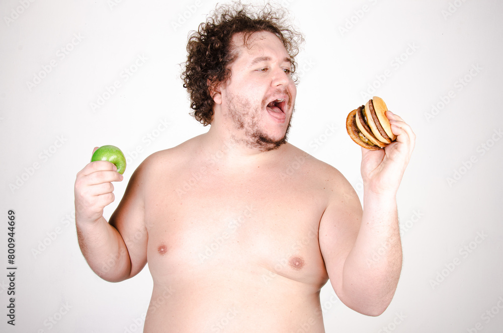 Fototapeta premium Funny fat man on a diet.