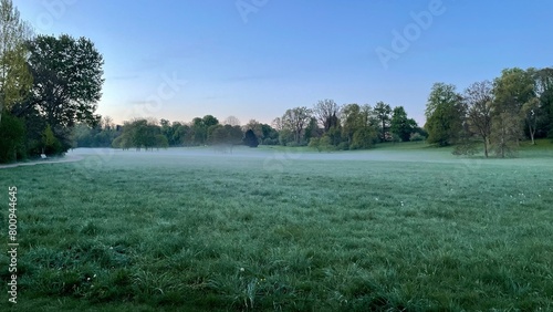 Sunrise and fog at dawn 5:00 AM end of April, Tiefurt Park in Weimar, Germany