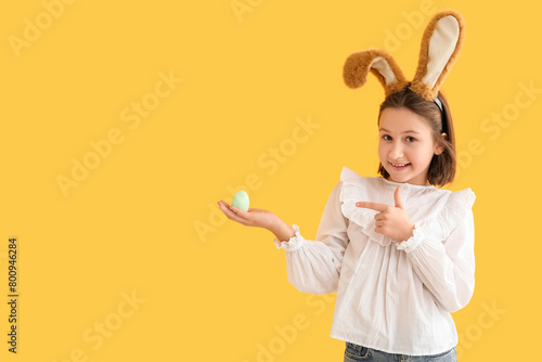 Happy little girl in bunny ...