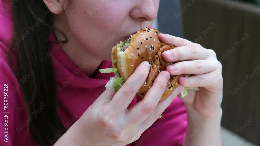 The process of eating a delicious burger The process of eating a delicious burger