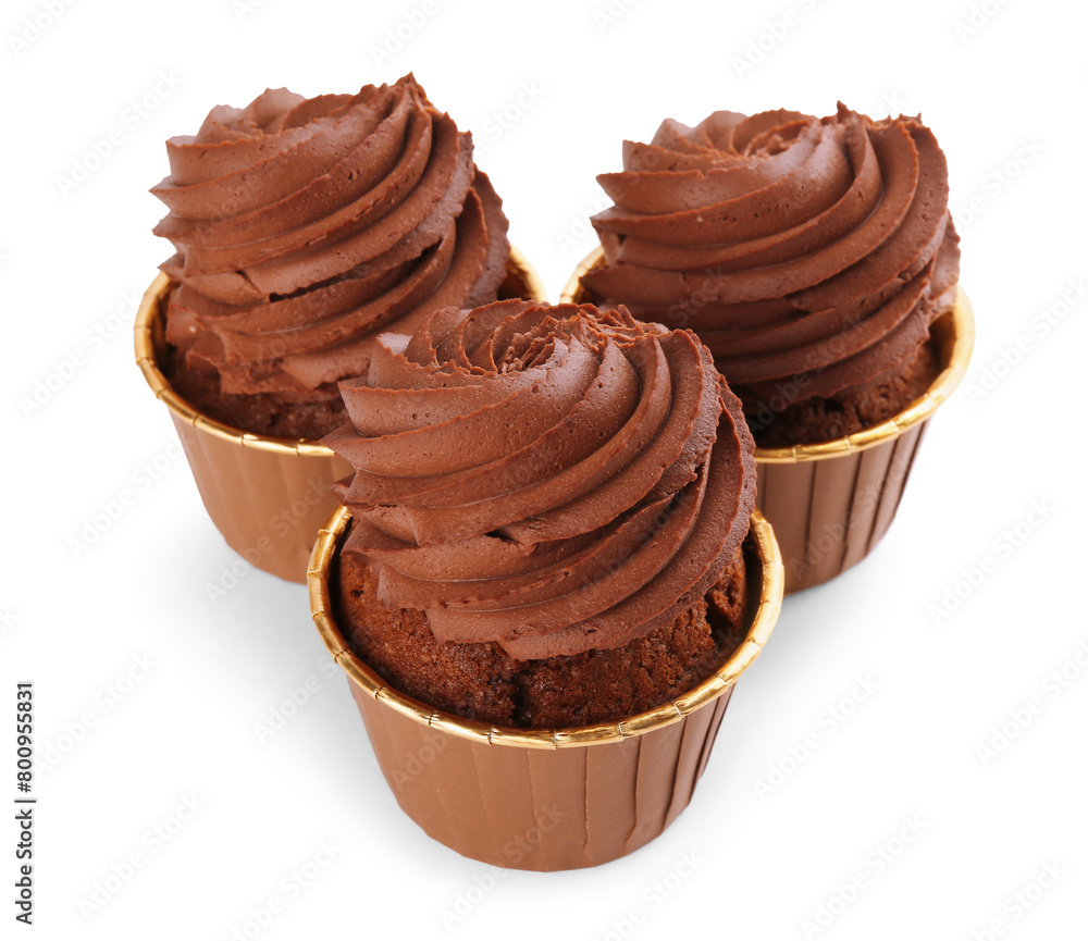 Three delicious chocolate cupcakes isolated on white Three delicious chocolate cupcakes isolated on white