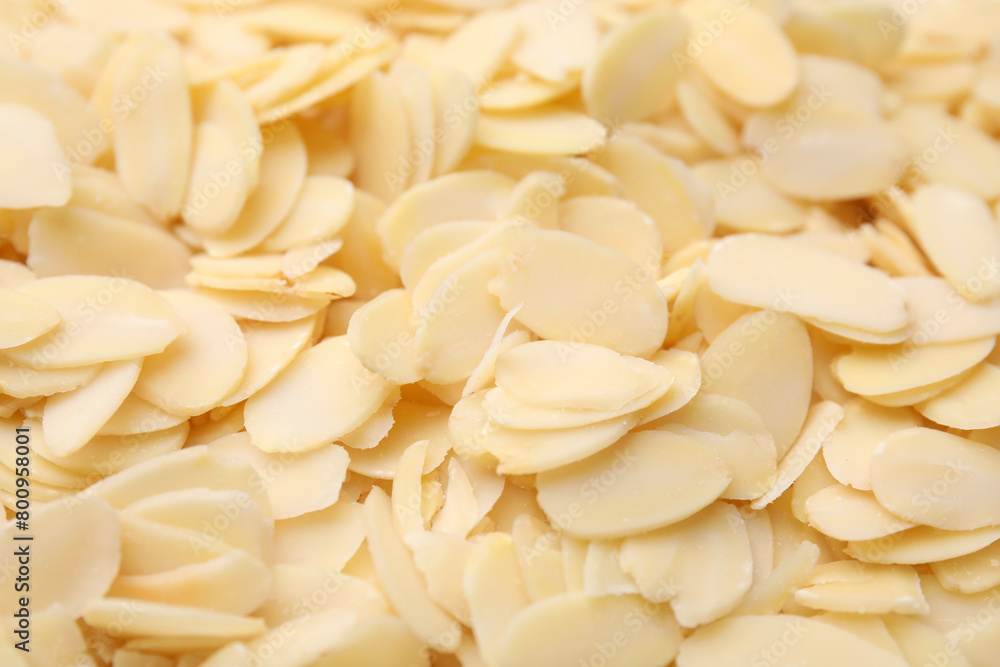Fresh almond flakes as background, above view Fresh almond flakes as background, above view