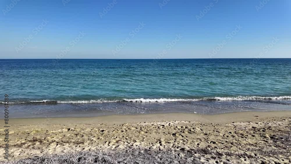 Ocean sea Aegean waters with sandy beach in Greece. Ocean sea Aegean waters with sandy beach in Greece.