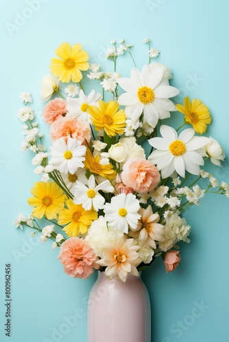Fresh spring flowers on a pastel background  upper half empty for copy space