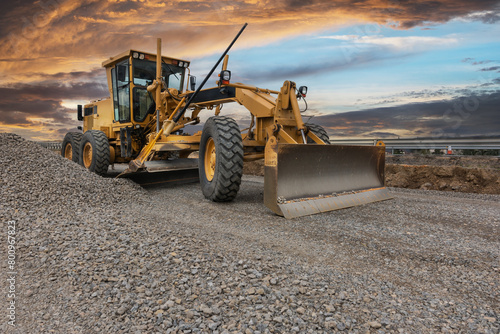 Excavator building a road in a site construction