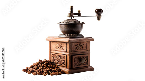 A coffee grinder surrounded by scattered coffee beans