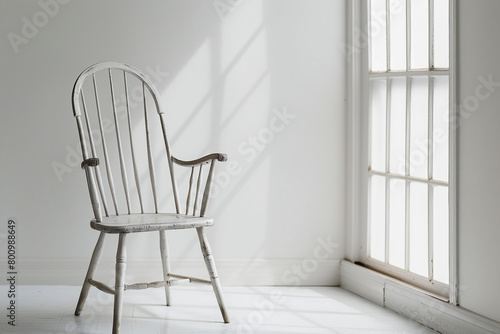 Graceful Windsor chair featured against a white backdrop.