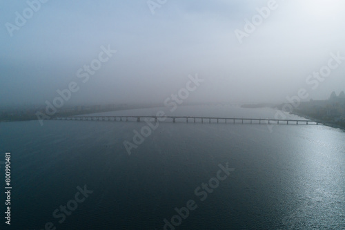 Aerial view of Dnipto city, Ukraine in fog. Cityscape. Panoramic view. Foggy metropolis. Ghost town. Atmospheric shot.