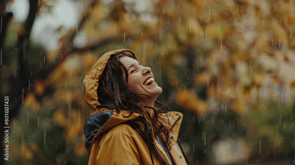 Woman in a chic raincoat making the most of a rainy autumn day, her laughter blending with the sound of rain Woman in a chic raincoat making the most of a rainy autumn day, her laughter blending with the sound of rain