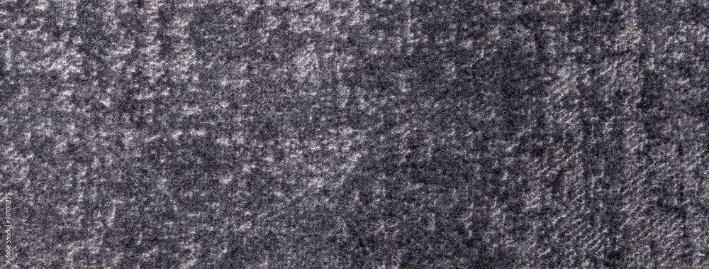 Fototapeta premium Texture of velvet dark gray and silver background from soft upholstery textile material, macro.