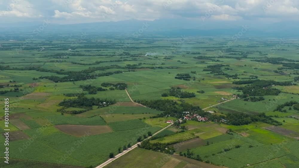 Aerial drone of countryside with farmland and rice fields. Negros, Philippines Aerial drone of countryside with farmland and rice fields. Negros, Philippines