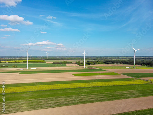 Spring farmlands and electric windmills. © Senatorek