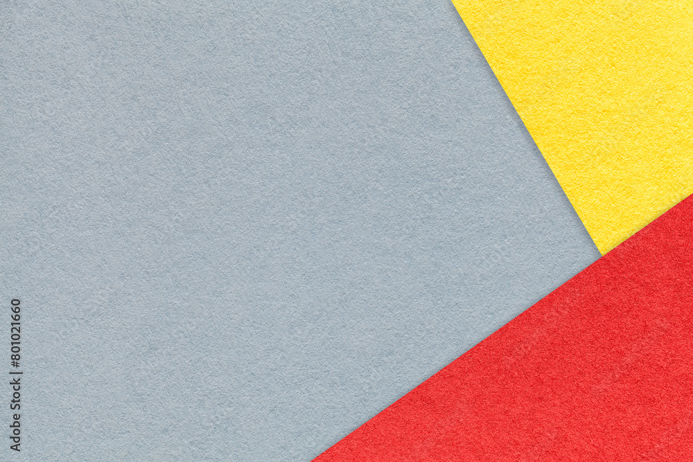 Texture of craft gray color paper background with yellow and red border. Vintage abstract grey cardboard. Texture of craft gray color paper background with yellow and red border. Vintage abstract grey cardboard.