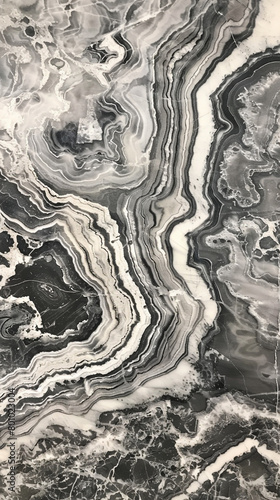 Silver Wave marble with silver-gray hues and flowing waves of veining © tippapatt