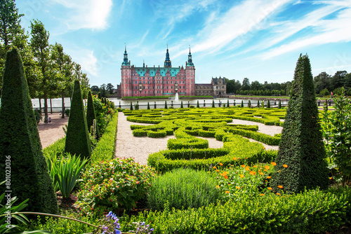 beautiful landscape with magical incredible gardens and park Frederiksborg slot Castle near Copenhagen. Hillerod, Denmark. Exotic amazing places. Popular tourist atraction. photo