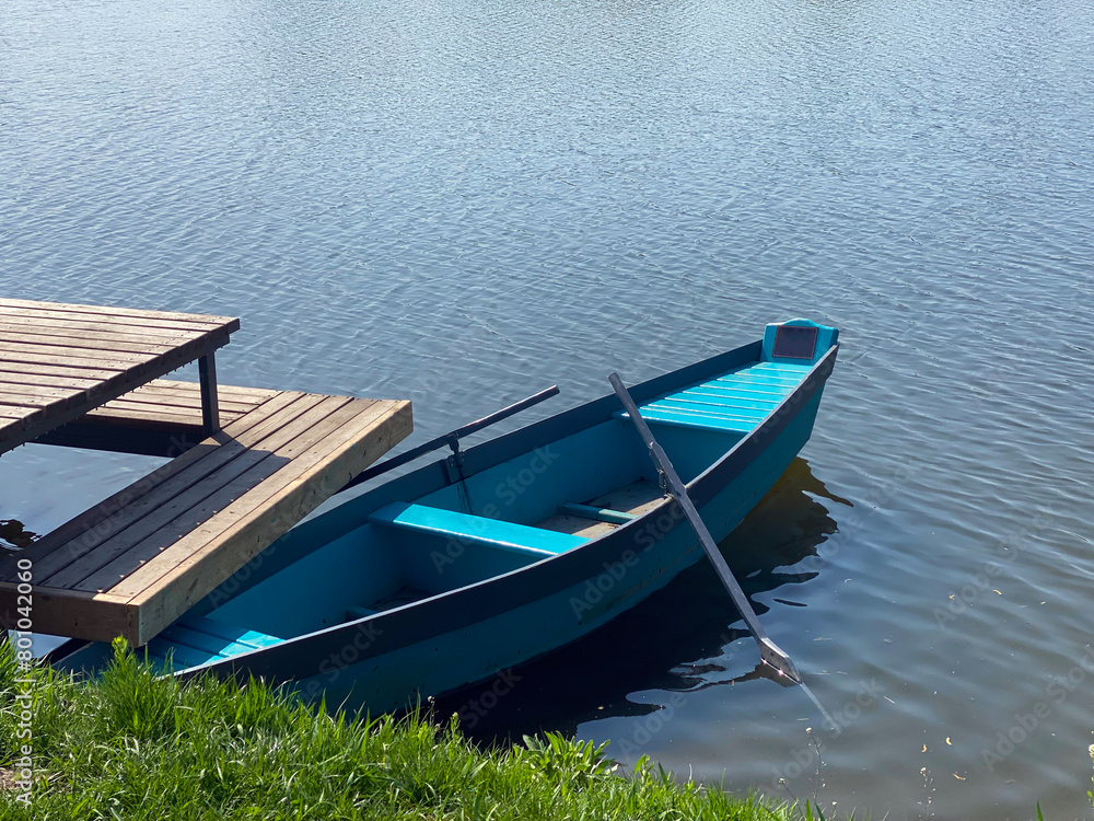 Wooden boat on the lake