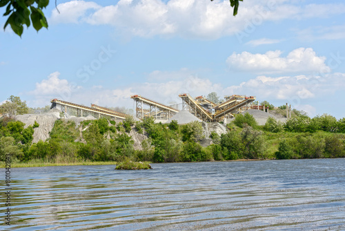 Small crusher plant is operating at wild nature place.