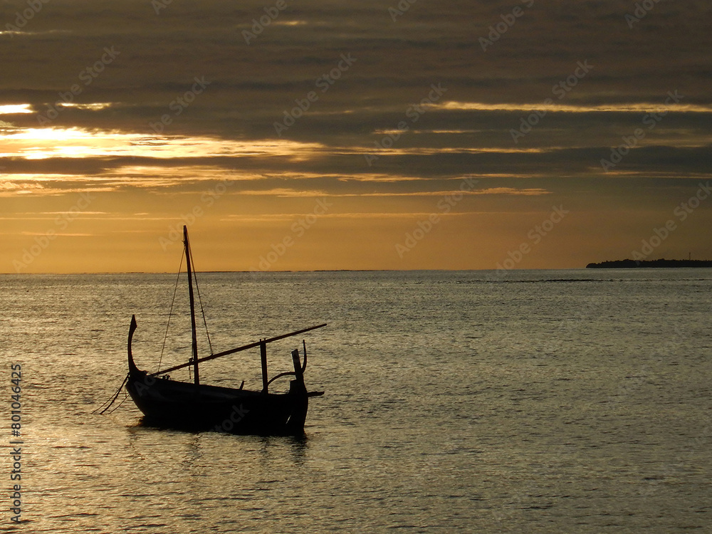 fishing boat at sunset