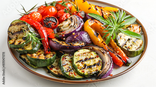 Plate with tasty grilled vegetables on white background © Salman