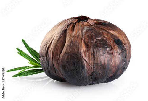 Black garlic and rosemary isolated on white background. With clipping path.