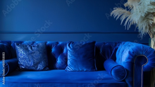 Blu sofa in the room with blu background