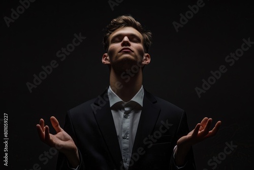 Businessman Hypnotist in Dark Background. Mesmerizing Adult Caucasian Male Using Hypnotic photo