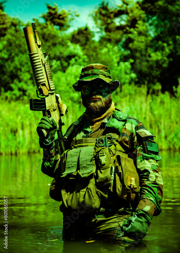 A focused soldier standing the marshland with his rifle, submerging himself, his arms and rifle visible, harsh military service half-length shot