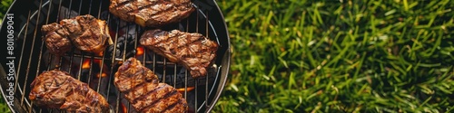 Top-View Charcoal Kettle Grill for Perfectly Grilled Steaks Outdoors on a Sunny Day.