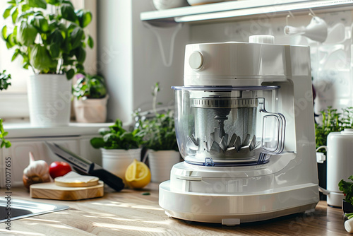 A white food processor with a wide range of attachments, from slicing to shredding.