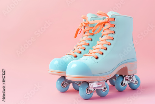 Roller skates isolated on pink background. Copy space for text.