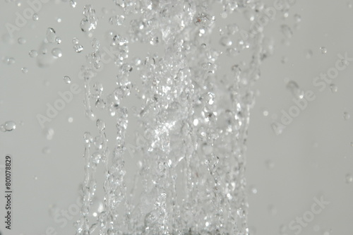 real water splashes and drops, abstract background © Emmanuel
