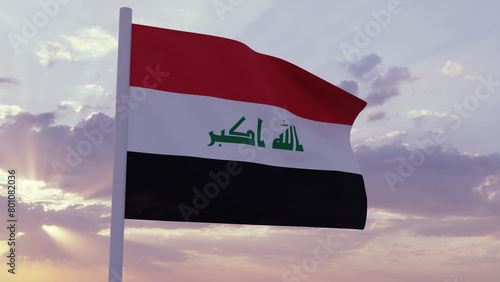 Flag of Iraq in the wind on a sunset sky