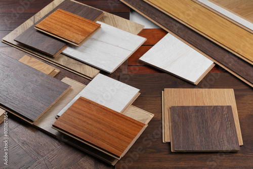 Принти на полотні Many different samples of wooden flooring on table