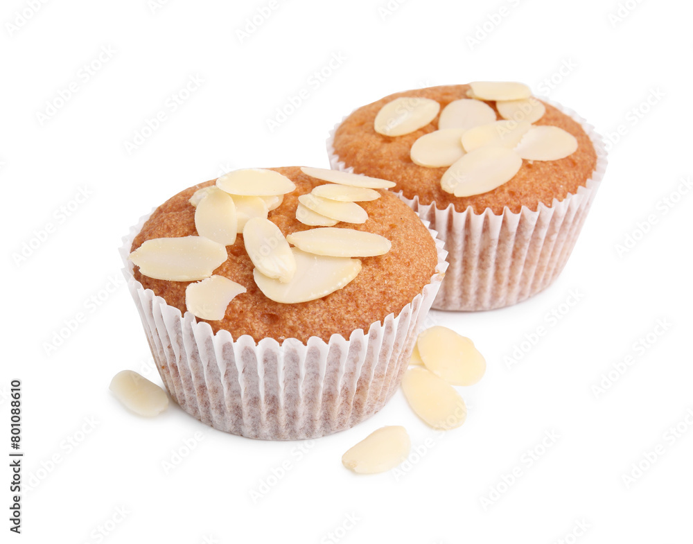 Muffins with fresh almond flakes isolated on white Muffins with fresh almond flakes isolated on white