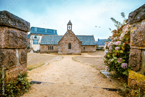 small chapel on the coast of french brittany. La Chapelle Saint-Guirec (Saint-Guirec Chapel) is a chapel located in front of the Plage Saint-Guirec (Saint-Guirec beach).