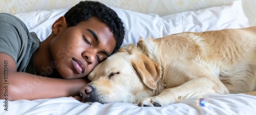 Young man and dog peacefully sleeping together on a white bed in a cozy home setting
