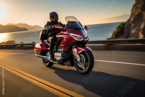 A person on an iconic Triumph Bonneville motorcycle rides down a road. Generative AI © Jahan Mirovi