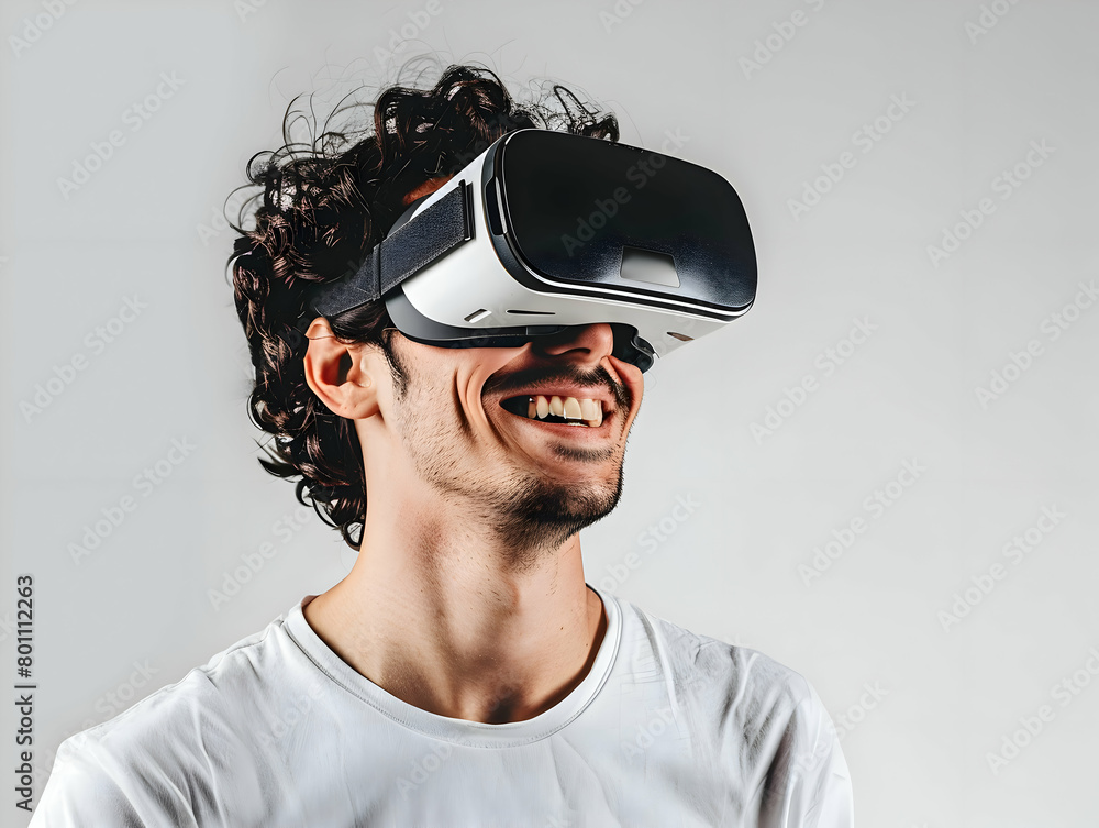 Portrait of happy young man wearing white augmented virtual reality glasses on white color studio background with copy space Portrait of happy young man wearing white augmented virtual reality glasses on white color studio background with copy space