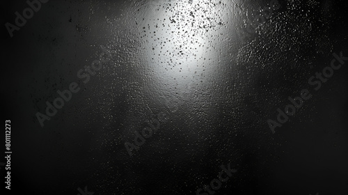 Spot illuminated on a dark grey noise texture banner header poster backdrop copy space with a black and white grainy gradient background