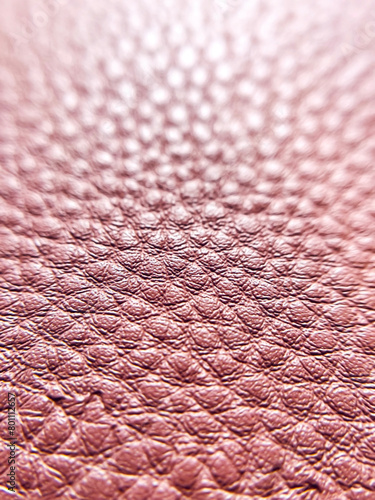 texture of perforated synthetic red eco leather background