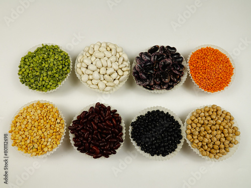 Various sorts of legumes that are used as a dry grain for human consumption, colorful natural texture background.
