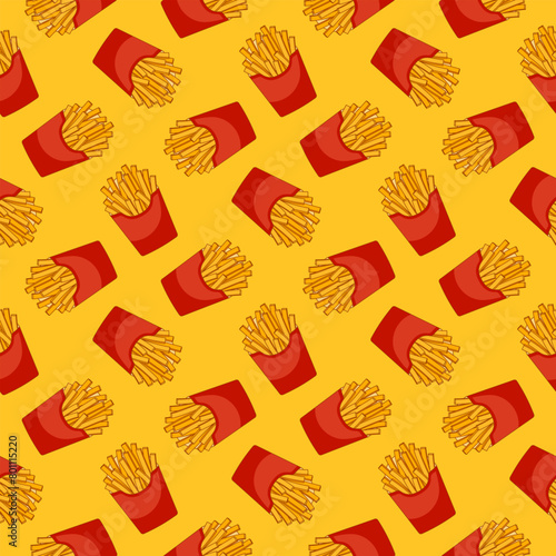 Seamless pattern with cartoon french fries in red paper pack on yellow background. Vector flat backdrop © OWLISKO DESIGN